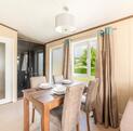 Pemberton Rivington for sale at Rockbridge Park 5 star caravan park, Wales - dining area photo