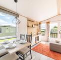 Atlas Style caravan holiday home for sale on 5 star caravan park in Wales - dining area photo