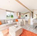 Atlas Style caravan holiday home for sale on 5 star caravan park in Wales - lounge photo