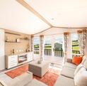 Atlas Style caravan holiday home for sale on 5 star caravan park in Wales - lounge photo