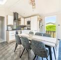 Willerby Vogue Nouveau for sale on 5 star caravan holiday park. Kitchen dining area photo