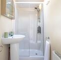 Self catering caravan holidays 5 star holiday park Wales shower room photo