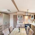 ABI Beaumont caravan holiday home for sale at Pearl Lake Country Holiday Park - kitchen dining area photo