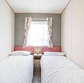 ABI Roecliffe caravan holiday home for sale at Discover Parks twin bedroom photo