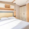 ABI St David for sale at Arrow Bank 5 star holiday park with fishing. Master bedroom photo