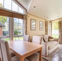 Pemberton Serena holiday home for sale at Pearl Lake Country Holiday Park, Herefordshire. dining area photo.