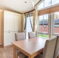 Pemberton Serena holiday home for sale at Pearl Lake Country Holiday Park, Herefordshire. dining area photo.