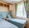 Pemberton Serena holiday home for sale at Pearl Lake Country Holiday Park, Herefordshire. Twin bedroom photo.