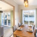 Sunseeker Sensation Lodge for sale at Pearl Lake 5 star caravan park with golf and fishing. Dining photo