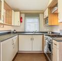 Willerby Avonmore holiday home for sale on riverside plot at Arrow Bank. Kitchen photo