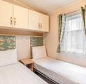 Willerby Avonmore holiday home for sale on riverside plot at Arrow Bank. Twin bedroom photo