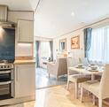 ABI Clarendon for sale at Arrow Bank 5 star holiday park with fishing. Kitchen dining area photo