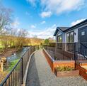 Luxury Cosgrove Lodge residential park home for sale in Wales. Exterior photo