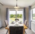 Victory Parkview Lodge for sale at Rockbridge Park Wales - dining area photo