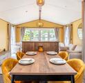 Regal Cranleigh Lodge holiday home for sale at Pearl Lake Country Holiday Park. Dining area photo