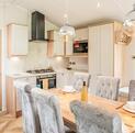Willerby Vogue Classique holiday home for sale at Pearl Lake Country Holiday Park, Herefordshire. Kitchen dining area photo