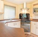 ABI Sunningdale Premier holiday home for sale at Pearl Lake Country Holiday Park, Herefordshire. Kitchen photo