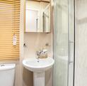 Pemberton Marlow Lodge holiday home for sale at Pearl Lake Country Holiday Park, Herefordshire. Family shower room photo.