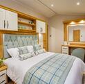 willerby dorchester for sale at discover parks, pet friendly holiday park, master bedroom photo 1