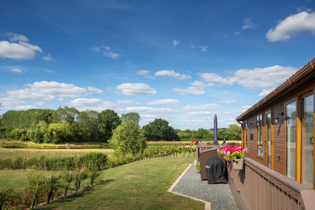 Overlooking the nature area and pool at Arrow Bank Country Holiday Park