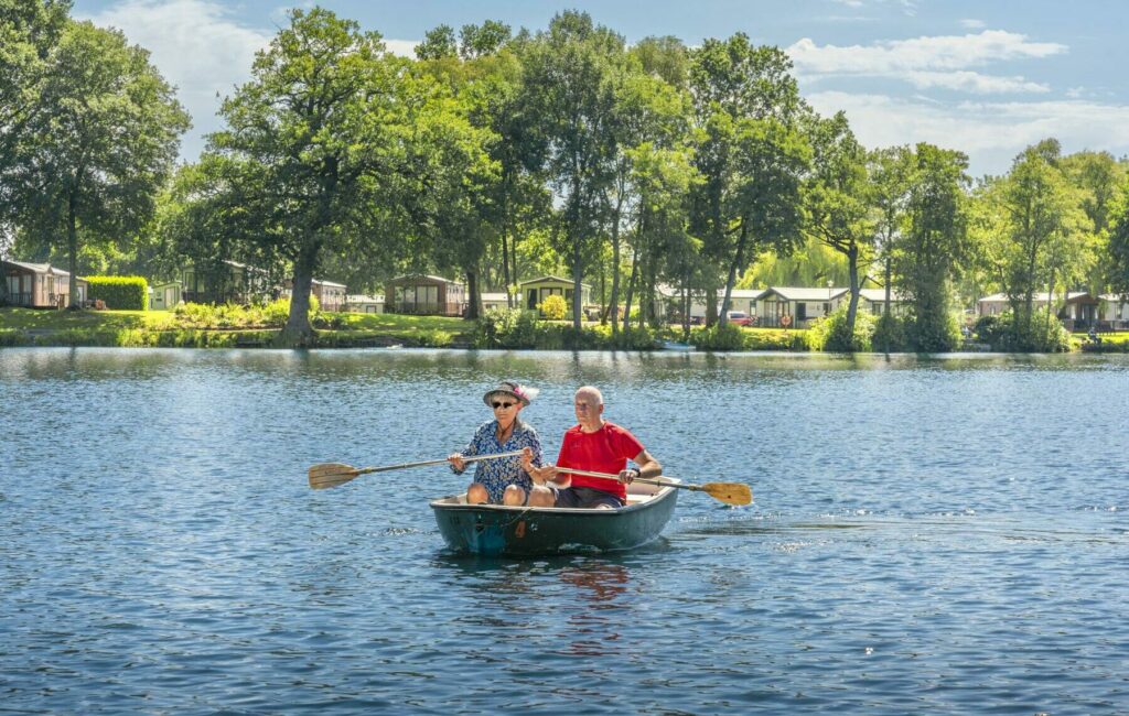 Boating Guests on Lake - Discover Parks
