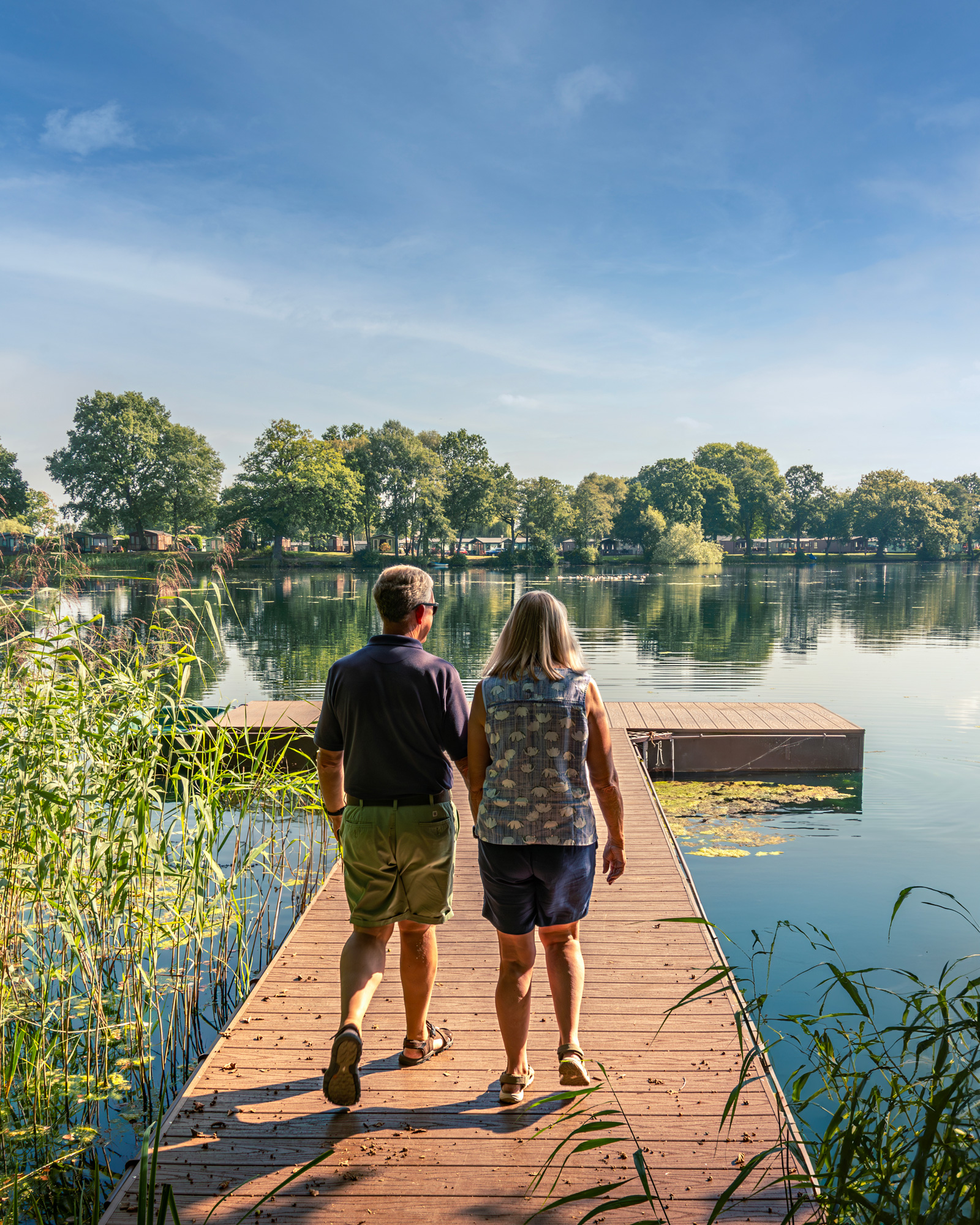 Happy-Couple-Looking-at-Lake