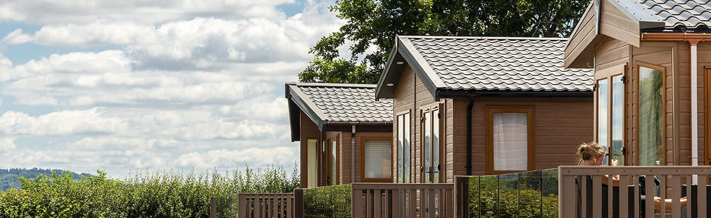 Holiday-Lodges-with-Countryside-Views-scaled-e1749113282864-aspect-ratio-2080-640