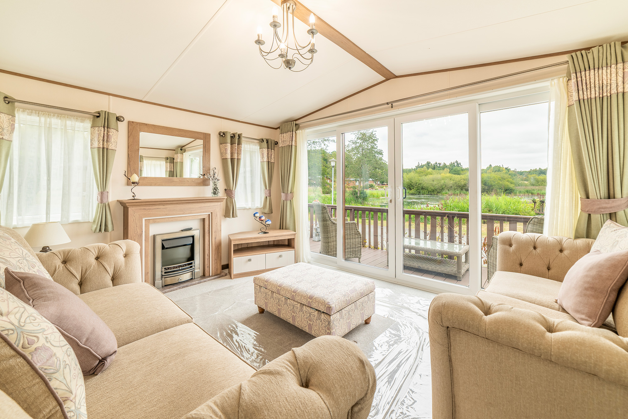 ABI Beaumont for sale at Discover Parks on lake edge plot. Lounge photo