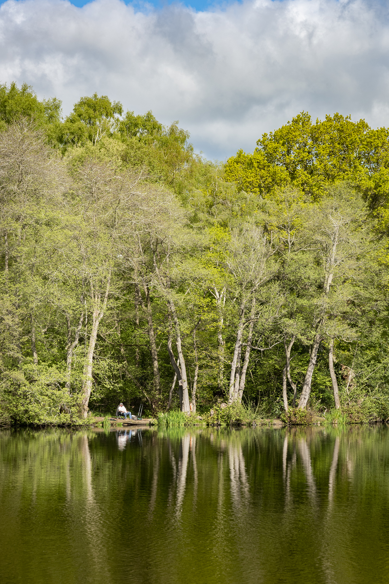 Carp fishing lake at Pearl Lake holiday park, Herefordshire. Fisherman photo