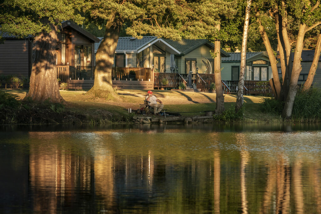 Carp fishing lake at Pearl Lake holiday park, Herefordshire. Fisherman photo